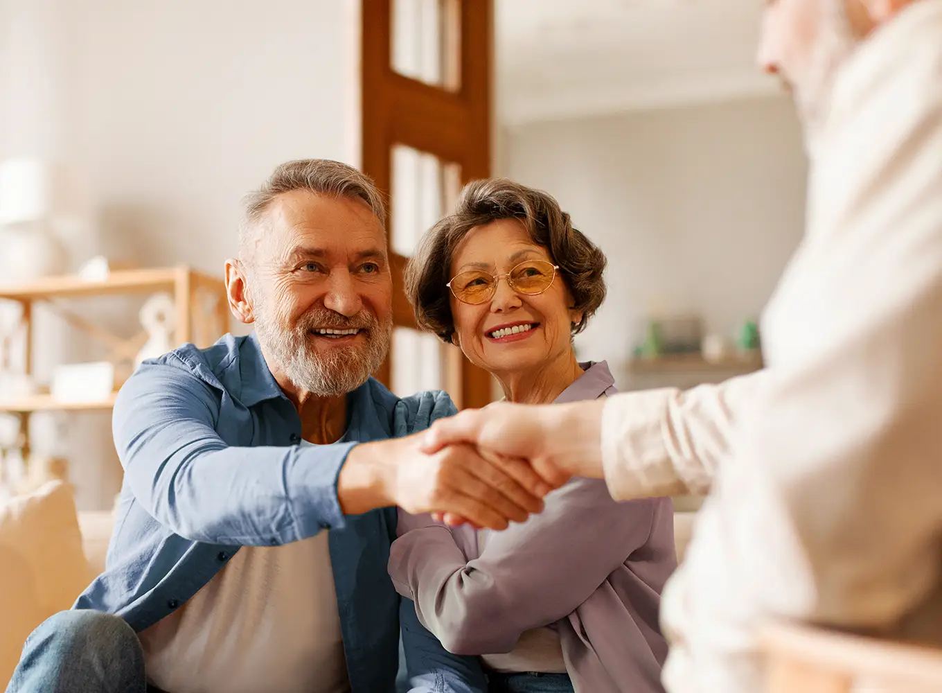 elderly couple speaking with insurance advisor - Springfield, IL